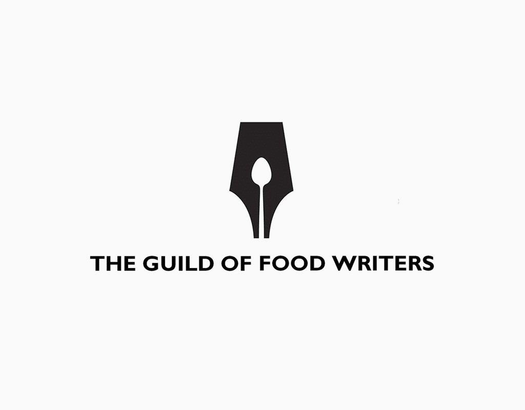 The guild of food writers logo